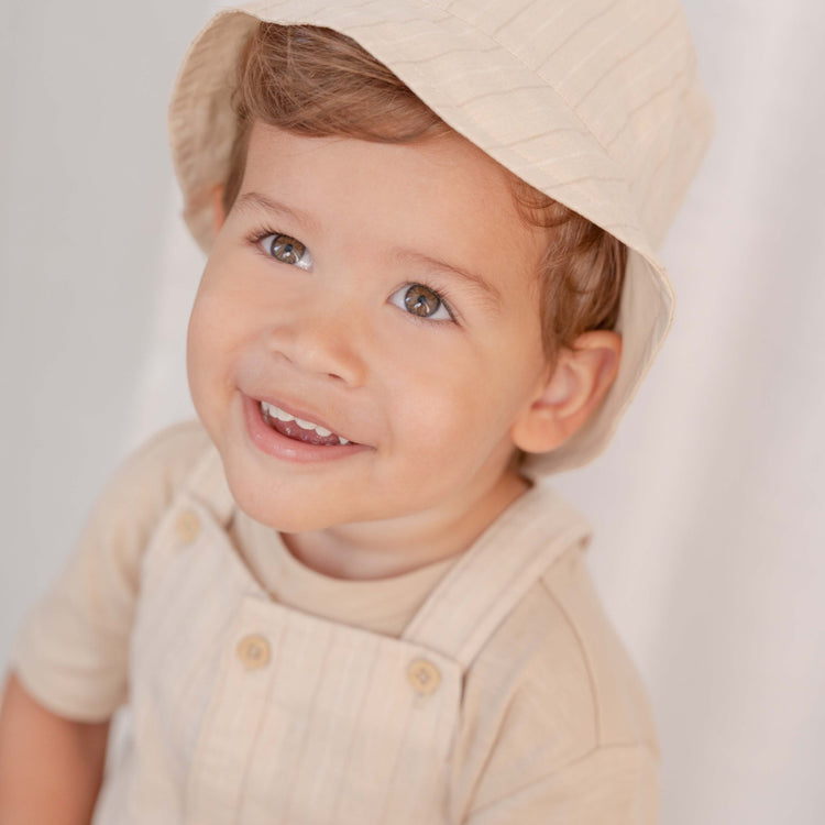 LITTLE DUTCH. Reversible hat Sand Stripes / Beige