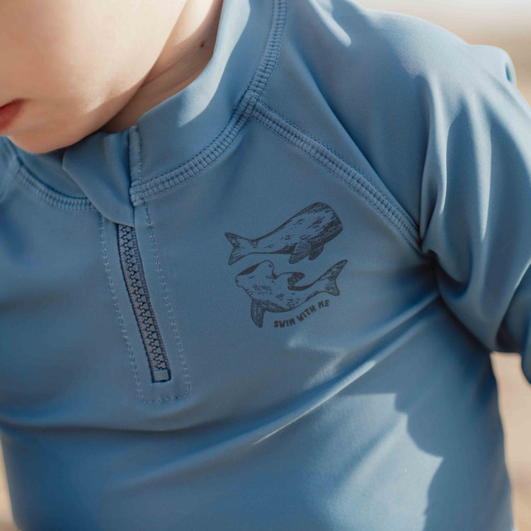 LITTLE DUTCH. Μπλουζάκι μακρυμάνικο με προστασία UV Blue Whale