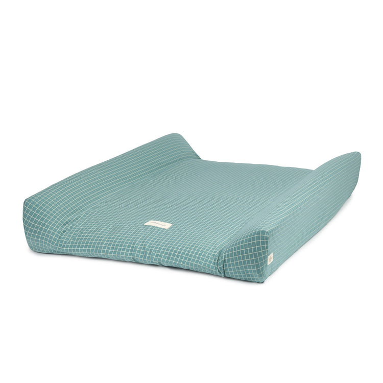 ##STORIES. Changing cover Limited edition - organic cotton jersey Teal Cream Grid 50x70